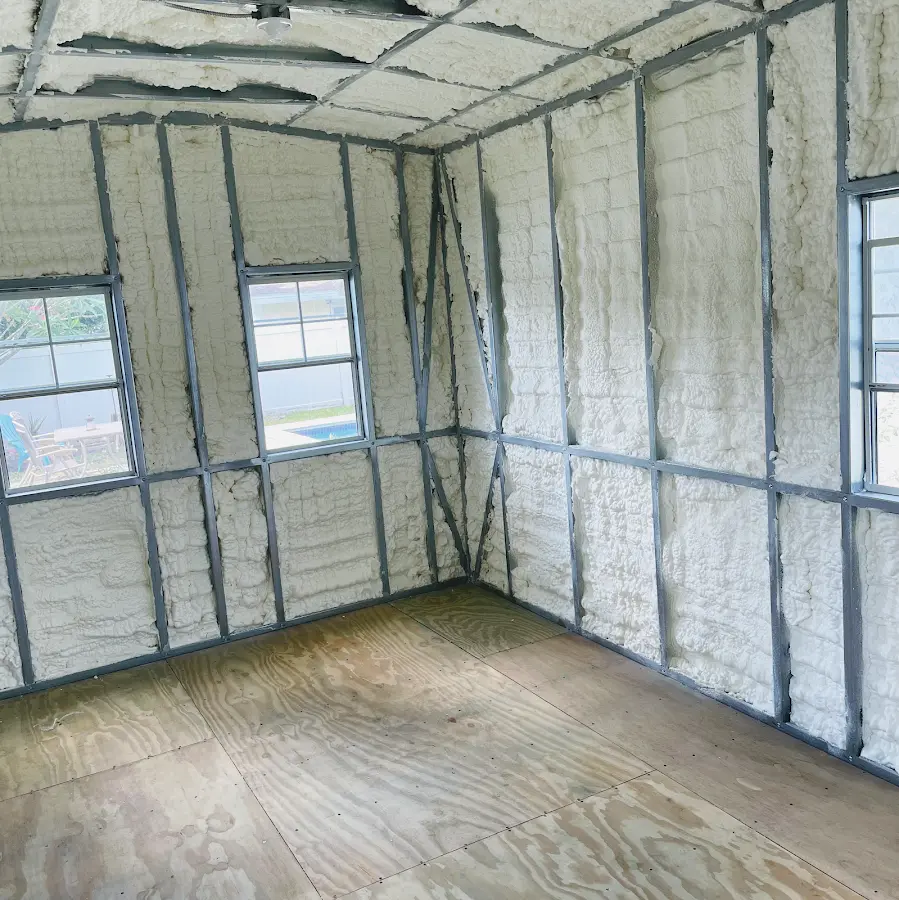 Closed-cell spray foam insulation applied to wall cavities in a residential project in Middle Smithfield